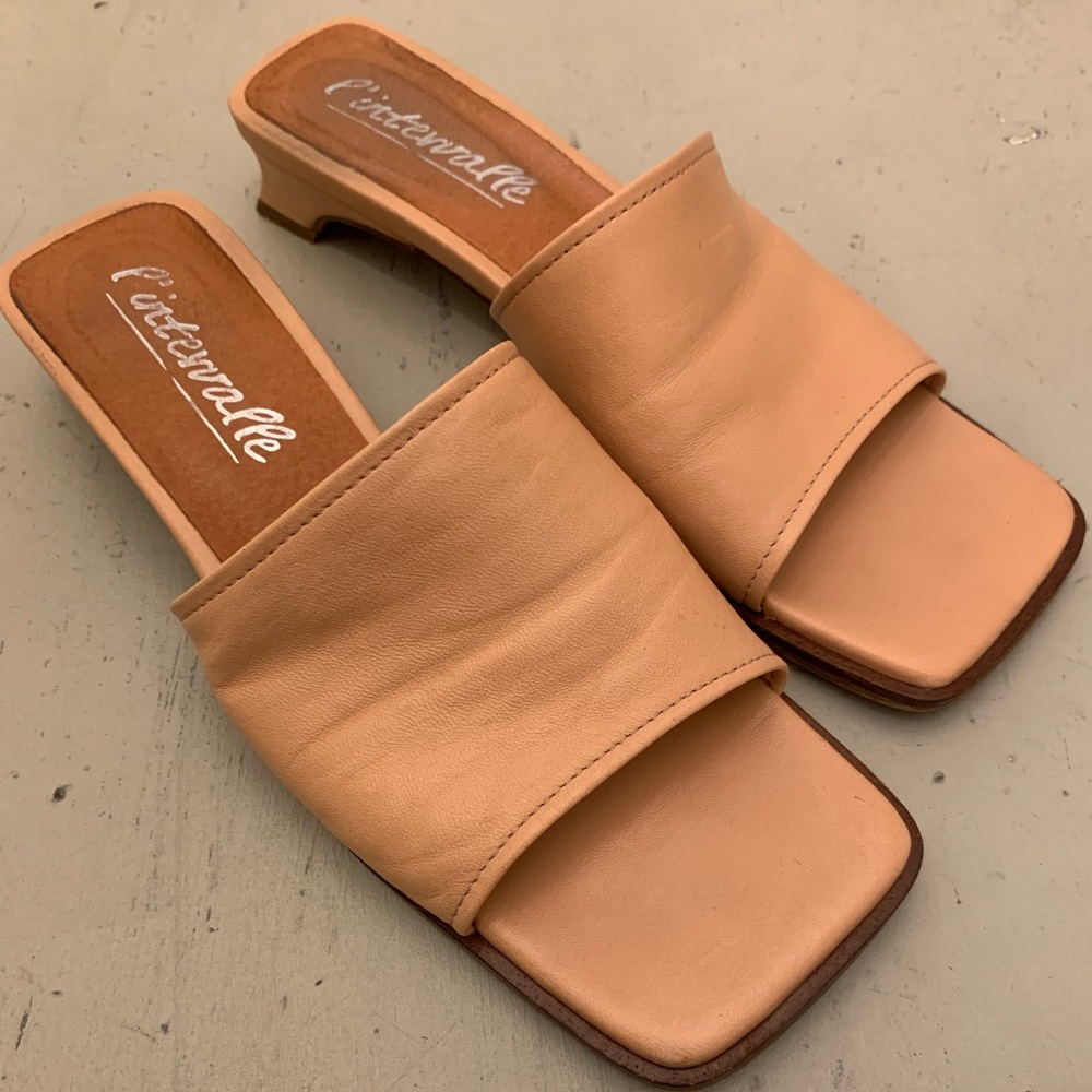 made in spain, super soft leather like butter. low heal sandals in great shape.